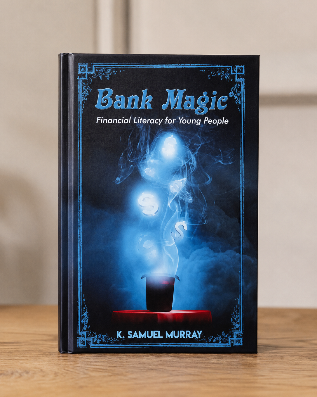 Book titled 'Bank Magic: Financial Literacy for Young People' by K. Samuel Murray on a wooden surface with a neutral background.